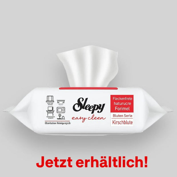 Reinigungskraft, die auf rote Packung Sleepy zeigt und grinst. Neue Sorte von Sleepys jetzt bei TempoSupply erhältlich!